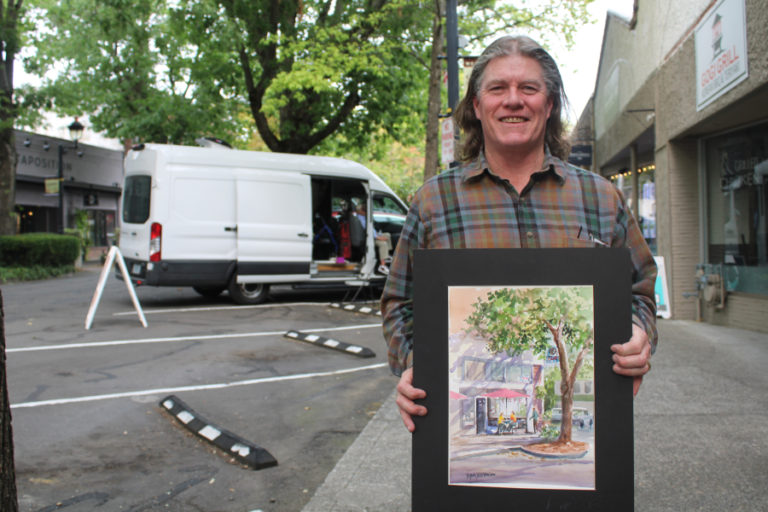 West Linn, Ore., artist Peter X O&#039;Brien shows his painting of Natalia&#039;s Cafe in downtown Camas during the 2021 Plein Air art event on Friday, Sept.