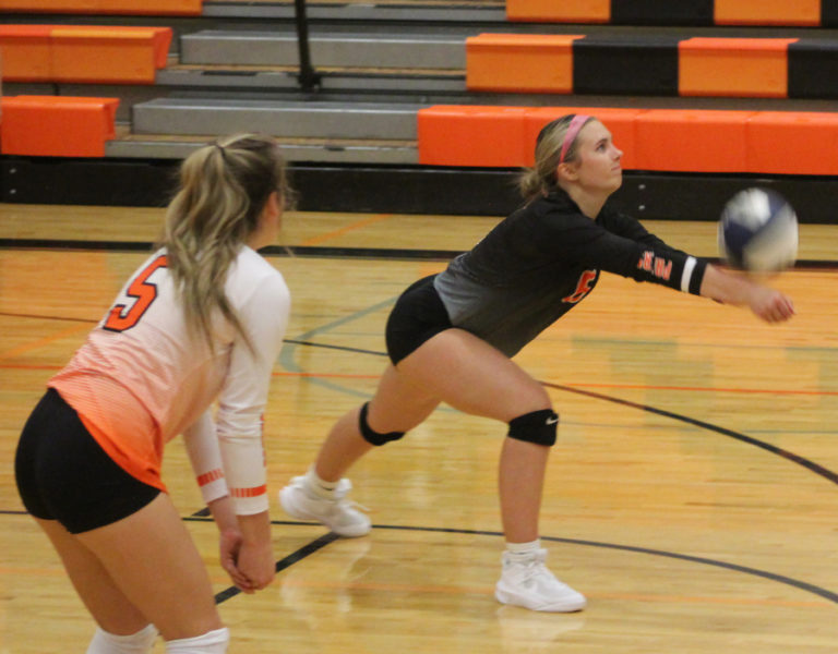 Washougal volleyball player Samantha Jackson (right) returns a serve as Madeline King looks on during an intrasquad scrimmage at Washougal High School on on Aug. 31, 2021. The Panthers volleyball team began its 2021 season with a match against Ridgefield on Sept.