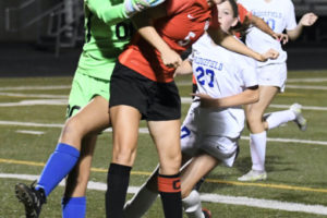 Camas senior Maya Parman (5) attempts to head a soccer ball past Ridgefield's goalie during a game on Sept. 9, 2021. (Contributed photo courtesy of Kris Cavin)
