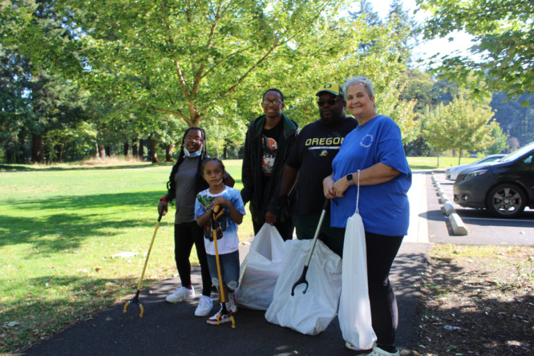 Wafertech employee Sherry Warren (right) volunteers to help clean the shores of Lacamas Lake each year. Here, Warren is pictured with her husband, Lamont Warren (second from right) and their grandchildren, Gabby Desmore, 10 (left); Jimmy Densmore, 7 (second from left); and Jordan Densmore, 15 (center), during the annual lake cleanup on Saturday, Sept.
