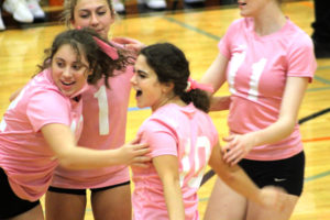 Washougal senior Lexi Melton (10) celebrates with teammates during a match against Hudson's Bay on Oct. 14, 2021. (Doug Flanagan/Post-Record)