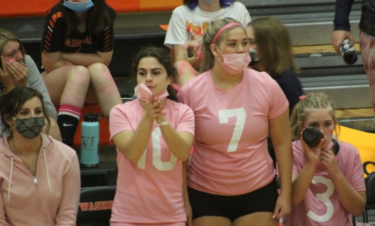 Doug Flanagan/Post-Record 
 Washougal senior Lexi Melton (second from left) encourages her teammates during the Panthers&#039; Oct. 14 match against Hudson's Bay.