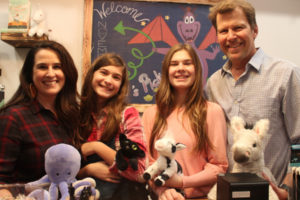 From left to right: Heather, Brooksley, Kinder and Dave Kesmodel, owners of the new Periwinkle’s Toy Shoppe in downtown Camas, show off their favorite “stuffies” on Sunday, Nov. 21, 2021. (Kelly Moyer/Post-Record)