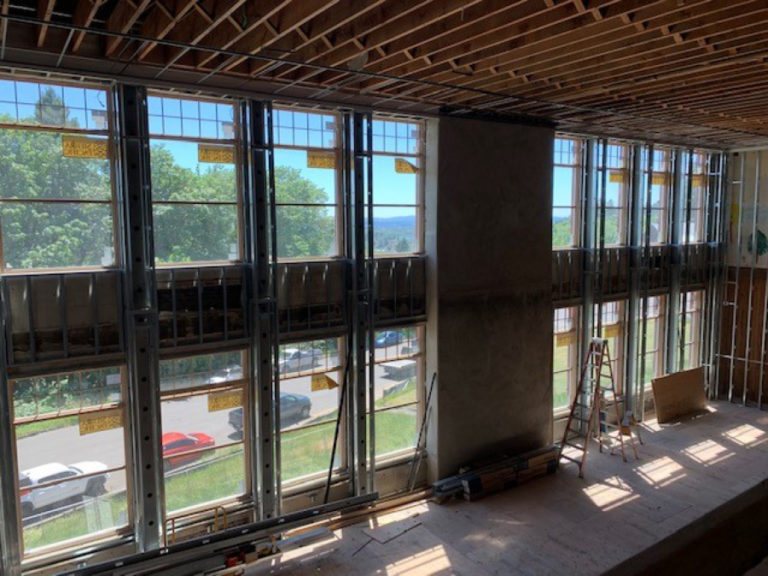New windows are installed inside the lobby area of the Joyce Garver Theater in June 2021. The Camas School District&#039;s remodel of the historic theater, funded by a construction bond voters passed in 2016, was deemed 98 percent complete as of Oct. 31, 2021.