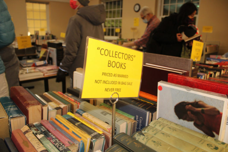 A table filled with &quot;collector&#039;s books&quot; sits inside the Camas Public Library during the Friends &amp; Foundation of the Camas Library&#039;s annual December book sale on Friday, Dec.