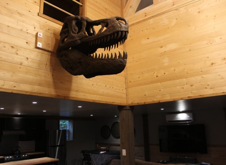 A dinosaur head is perched on one of the walls in the &quot;Jurassic Retreat&quot; rental house in rural Washougal.