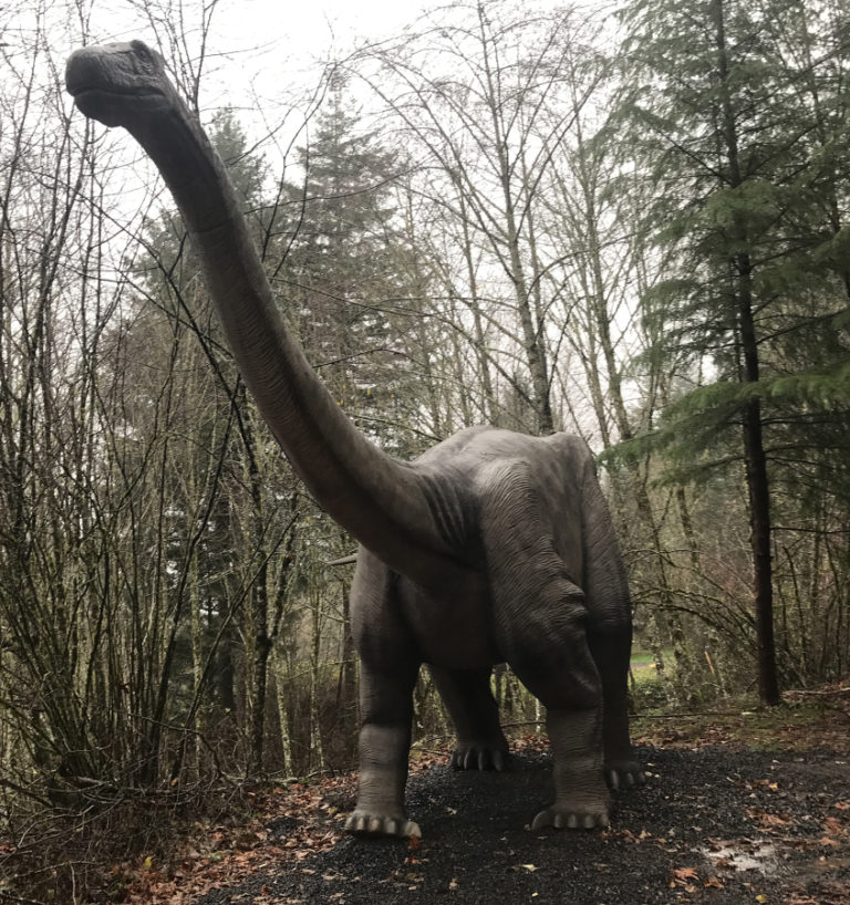A 56-foot-tall animatronic apatosaurus welcome guests to the &quot;Jurassic Retreat&quot; home in rural Washougal.