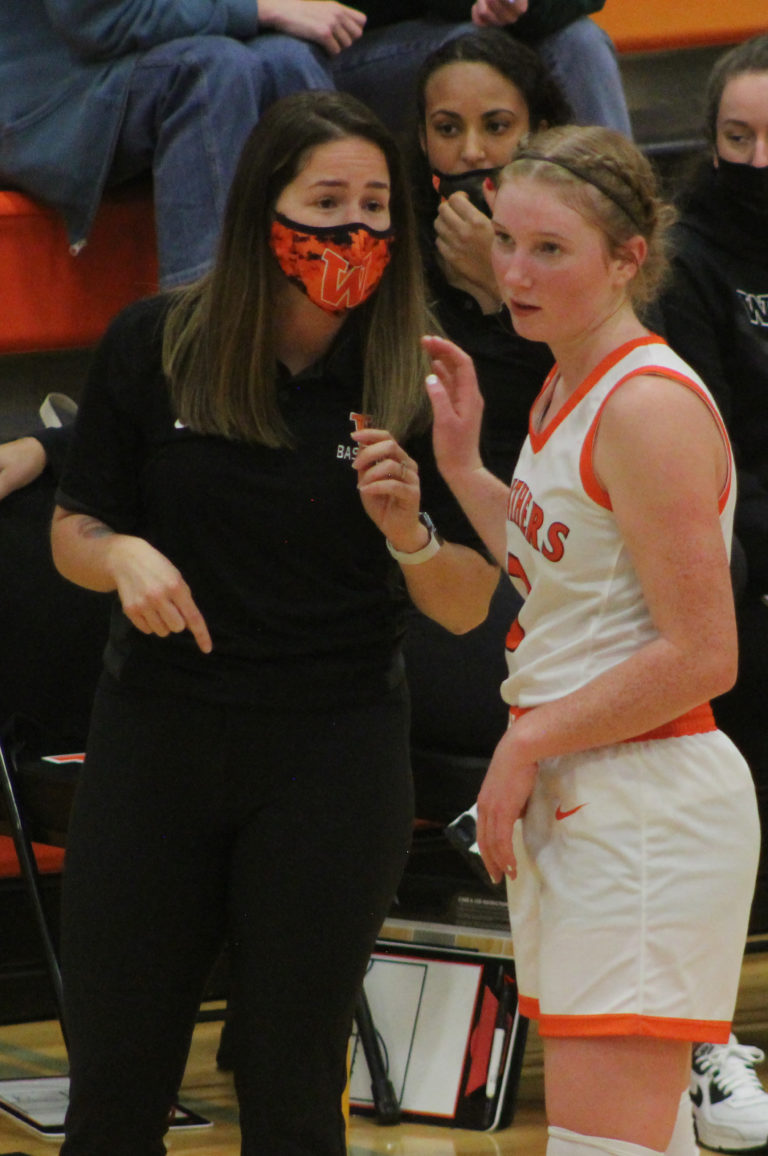Washougal senior Savea Mansfield (right) talks with Panthers coach Britney Ervin during the team's home game against Hudson's Bay on Tuesday, Dec. 14.