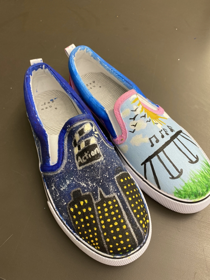 A pair of shoes are displayed after Jemtegaard Middle School art students completed their &quot;Roots and Wings&quot; project earlier this month.