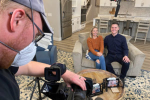 Washougal residents Kayla Gentry (center) and Graham Gentry (right) film an episode of HGTV's "House Hunters" in November 2021. (Contributed photo courtesy of Graham Gentry)