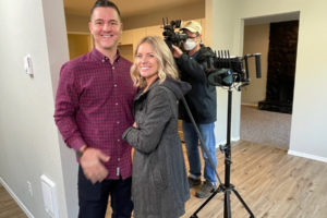 Washougal residents Kayla Gentry (center) and Graham Gentry (left) film an episode of the HGTV series 