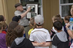 Two Rivers Heritage Museum volunteer Walt Eby leads a group of students on a tour of the museum in 2015. (Contributed photos courtesy of Rene Carroll)