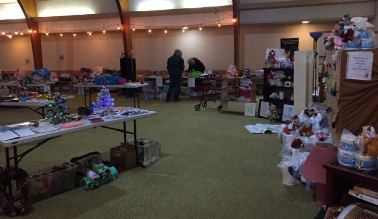 Local residents pick up food and gifts at The Outpost in Washougal, during a giveaway organized by the RAD Outreach team based out of Camas&#039; Radiant Church, on Saturday, Dec. 18, 2021.
