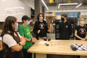 Robotics students (left to right) Silvia Pujol, Jack Harding, Will Jolley, Brenden Cavill and Taryn Cavill gather in Discovery High School's STEM lab on Dec. 1, 2021. (Kelly Moyer/Post-Record files)