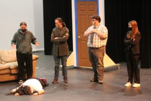 Washougal High School theater students (clockwise left to right) Chloe Dahler, Claire Siefert (on the ground), Jacob Haveman, Bart Stevens and Claire Zakovics rehearse the school's upcoming production of "Clue (High School Edition) on Friday, Feb. 11. (Doug Flanagan/Post-Record)