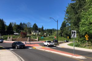 Vehicles travel through the traffic roundabout on Sixth Avenue in Camas in May 2019. (Kelly Moyer/Post-Record files) 