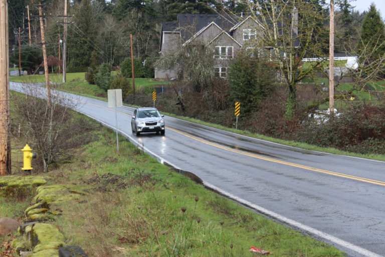 A car drives south on 32nd Street near Schmid Family Park in Washougal on Monday, March 21, 2022. The city of Washougal is applying for grant funding from the Washington State Department of Transportation's City Safety program to address its top road safety concerns.