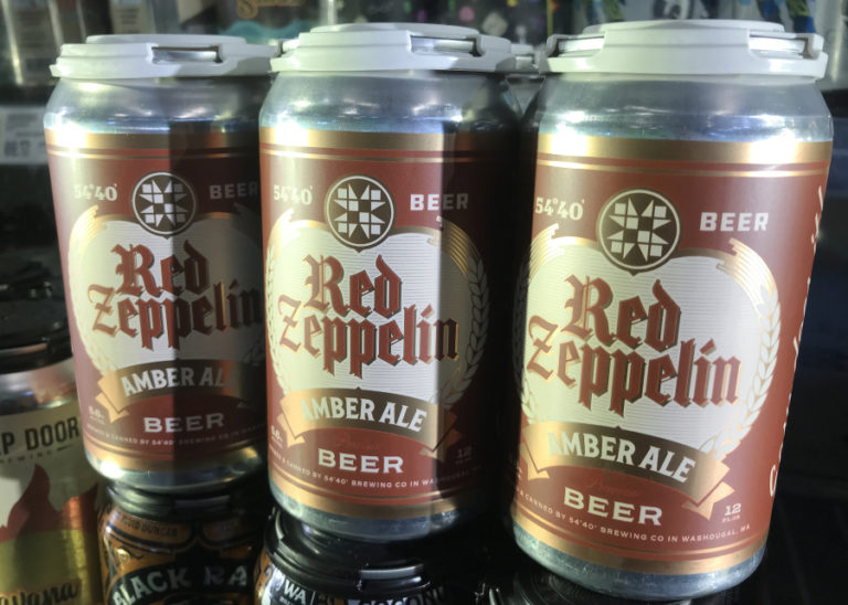 A six-pack of 54-40 Brewing Company&#039;s Red Zeppelin amber ale sits in a refrigerated display case at a QFC grocery store in east Vancouver on Friday, March 11, 2022.