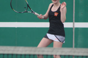 Washougal High School tennis player Avery Berg returns a shot during a match against Union High School on Friday, March 18, in Washougal. (Doug Flanagan/Post-Record)