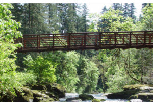 The cover of the city of Camas' 2022 Parks, Recreation and Open Space Plan shows a bridge in Camas' Washougal River Greenway. (Photo courtesy of the city of Camas)