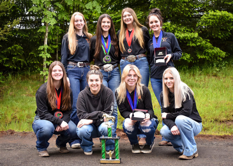 Contributed photo courtesy Brittni DeVault 
 Members of the Washougal equestrian team pose for a photo with their trophies and medals after winning the medium team division state championship at the 2022 Washington High School Equestrian Team state meet last month. (Contributed photo courtesy of Brittni DeVault)