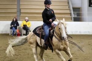Washougal High School freshman Kali Buchanan rides her horse, Jac, while competing in a reining event at an equestrian meet in April 2022. (Contributed photo courtesy of Brittni DeVault)