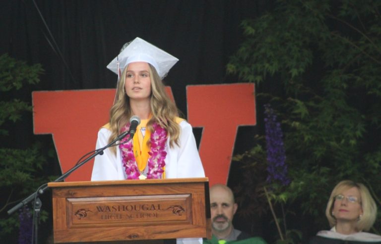 Doug Flanagan/Post-Record 
 Valedictorian Jaiden Bea speaks during the Washougal High School class of 2022 commencement ceremony at Fishback Stadium on Saturday, June 11.