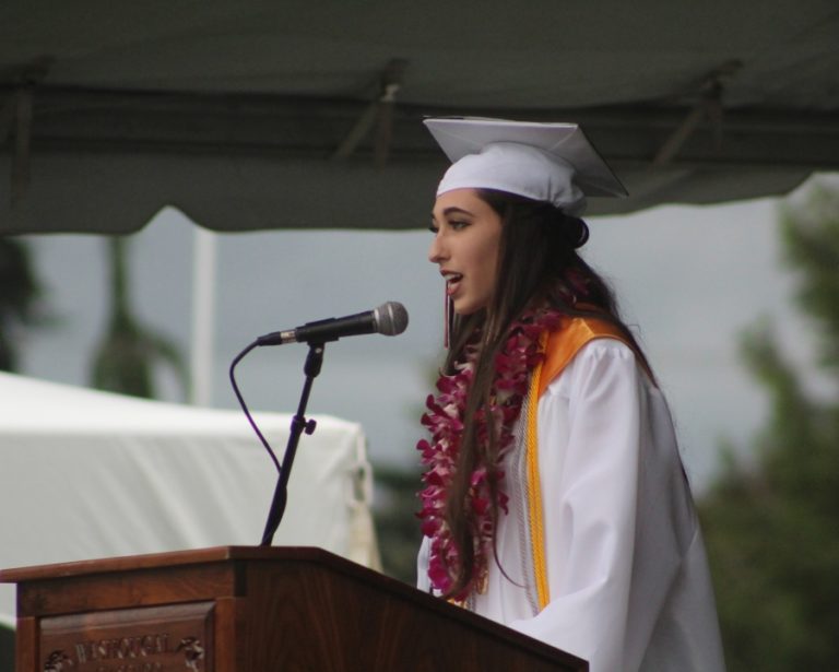 Doug Flanagan/Post-Record 
 Valedictorian Elise Moore speaks during the Washougal High School class of 2022 commencement ceremony at Fishback Stadium on Saturday, June 11.