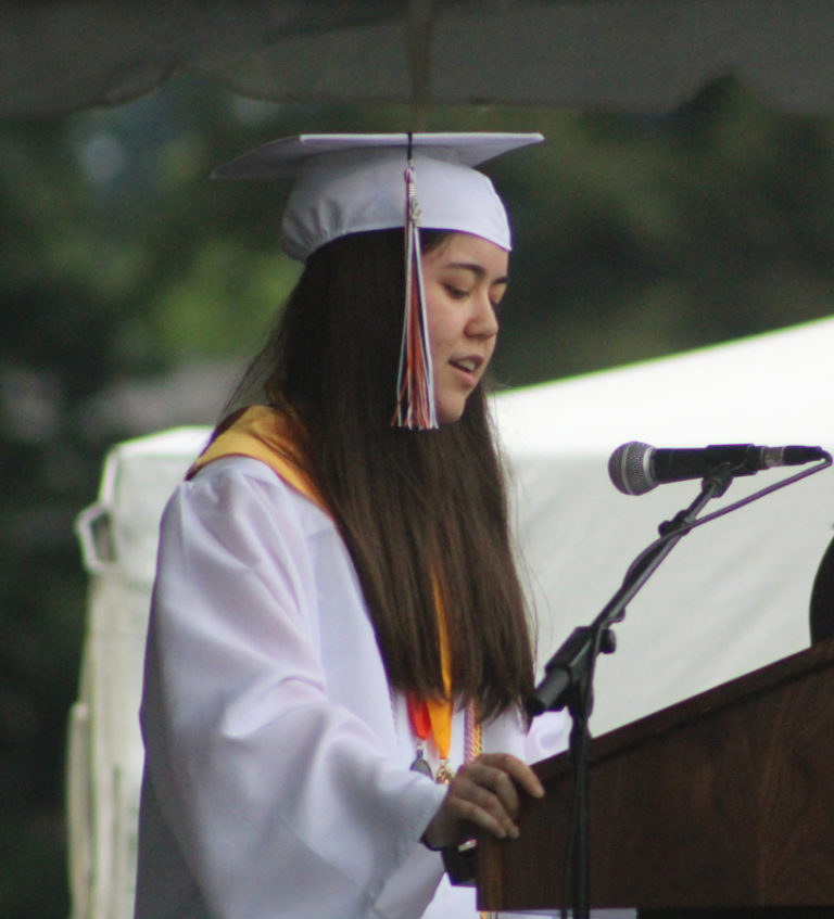Doug Flanagan/Post-Record 
 Valedictorian Lana White speaks during the Washougal High School class of 2022 commencement ceremony at Fishback Stadium on Saturday, June 11.