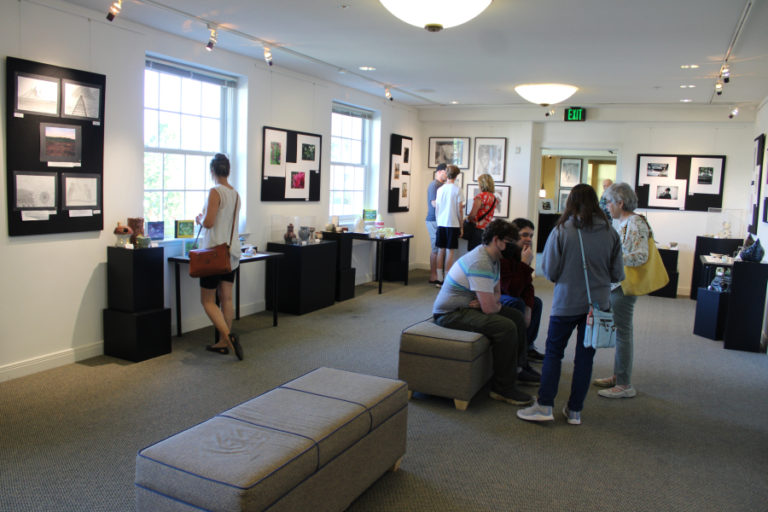 Visitors to the Second Story Gallery, located on the second floor of the Camas Public Library in downtown Camas, explore the &quot;Stepping Out&quot; youth art show on Friday, July 1, 2022.