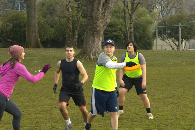 Members of the Goot Times Ultimate team (from left to right) Melissa Zarzana, Derek Lawton, Alva Barney and Bunny Truong play Ultimate Frisbee at Goot Park in Camas in 2022.