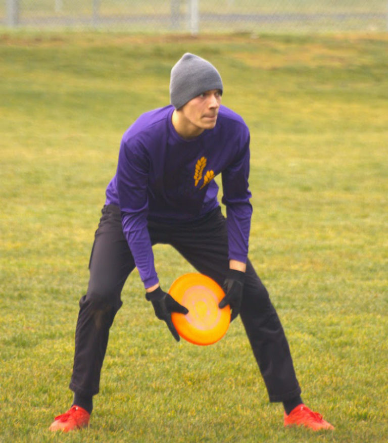 Evan Johnson, a member of the Goot Times Ultimate team, holds a flying disc at Goot Park in Camas in 2022.