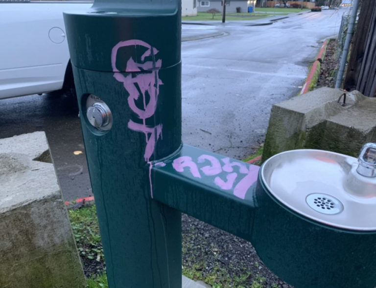 Graffiti is painted on a water fountain in the city of Washougal in 2022.