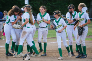 Washougal resident Gracie Olmos (second from left) is surrounded by her Greenberry Lady A's 12UB teammates after making the final out of the 2022 USA Softball of Washington state tournament, held July 1-3, 2022, in Vancouver. (Contributed photo courtesy of Jeanette Blunt)