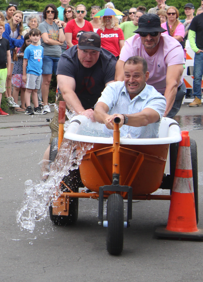 Jeremy Christensen (left), Ross Cobrzychi (right) and Dustin Thomas (in bathtub) of the 4th St.