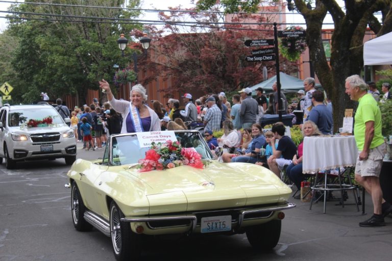 Molly Coston, the 2022 Camas Days queen, rides down Northeast Fourth Avenue in downtown Camas during the 2022 Camas Days Grand Parade Saturday, July 23, 2022.