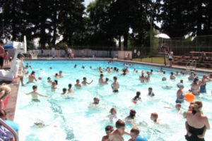 Families cool off at the Camas Municipal Pool in July 2013. City officials shuttered the pool in 2018, after reports showed it was "failing" and in need of major renovations. (Post-Record files)