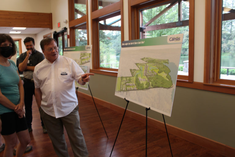Camas Mayor Steve Hogan discusses the city's North Shore subarea planning with members of the public during a North Shore open house at Lacamas Lake Lodge on Wednesday, Aug. 17, 2022.