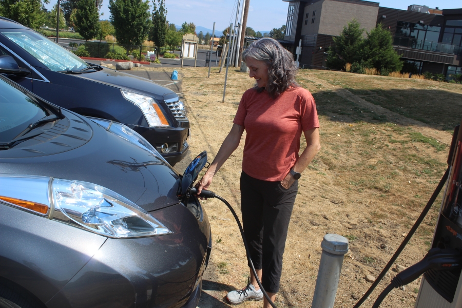 Port of Camas-Washougal Commissioner Cassi Marshall charges her electric vehicle (EV) at the Port's new EV charging station for the first time on Friday, Aug. 19, 2022. (Photos by Doug Flanagan/Post-Record)