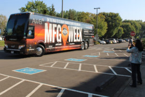 The Association of Washington Business' "Manufacturing Week" tour bus pulls into the Analog Devices parking lot in Camas on Oct. 10, 2022. (Photos by Kelly Moyer/Post-Record)
