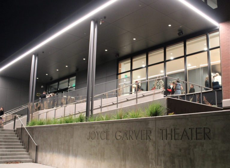 The outside of the Camas School District's newly renovated Joyce Garver Theater is illuminated during the historic theater's official reopening event on Wednesday, Oct. 19, 2022.