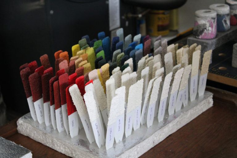 A collection of concrete-adhering paint color samples sits inside Camas artist Claire Bandfield's art studio on Monday, Oct. 31, 2022.
