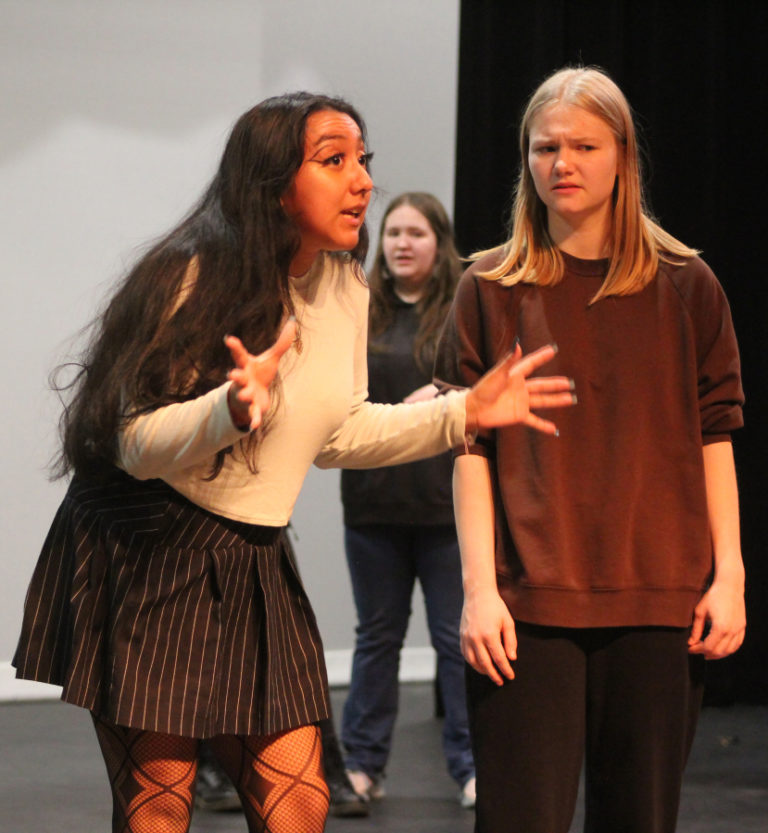 Washougal High students Daisha Paz-Mendoza (left), Kati Gilbert (right) and Juliet Collins rehearse for their upcoming production of &quot;She Kills Monsters: Young Adventurers Edition,&quot; the drama department&#039;s first production of 2022-23, inside Washougal High School on Nov.