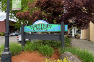 A "Downtown Camas" sign welcomes visitors to the city's historic downtown business district at the intersection of Northeast Fourth Avenue and Northeast Adams Street on May 8, 2021. (Photos by Kelly Moyer/Post-Record files)