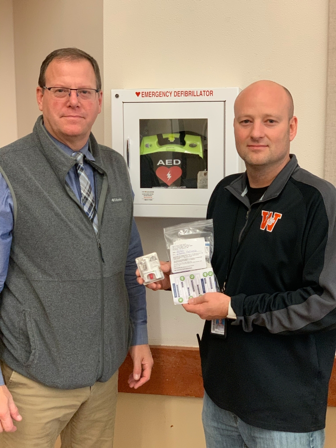 Contributed photo courtesy Washougal School District
Washougal School District assistant superintendent Aaron Hansen (left) and Washougal High School principal Mark Castle (right) display a dose of Narcan, a medication used to assist people who have experienced an overdose of opioids. The Washougal School Board recently approved a policy that states that Narcan will be placed in every one of the district&#039;s schools.