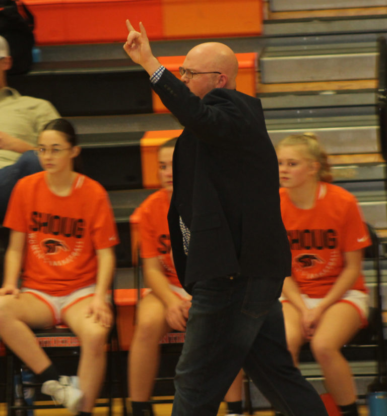 New Washougal High School girls basketball coach Tim Melcher (center) calls a play during the first half of the Panthers&#039; game against visiting Tumwater on Friday, Dec.