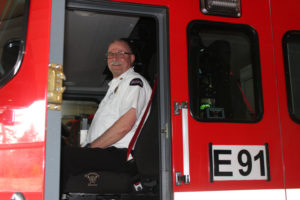 East County Fire and Rescue Fire Chief Mike Carnes sits in an engine at ECFR Fire Station 91 near Grove Field in northern Camas on March 7, 2019. (Kelly Moyer/Post-Record files) 