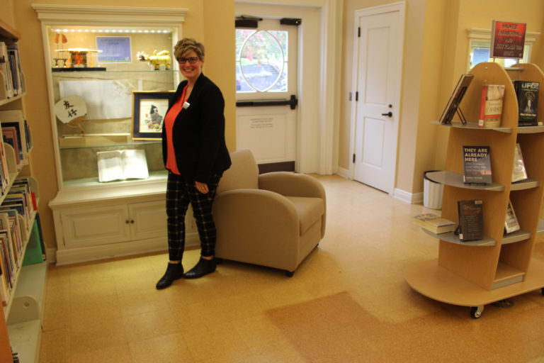 Camas Public Library Director Connie Urquhart shows one of the original features of the historic library building located at 625 N.E. Fourth Ave., in downtown Camas, on Friday, Oct. 28, 2022.