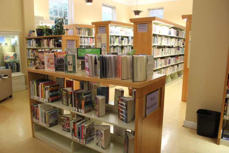 Books are stacked in the oldest part of the Camas Public Library on Friday, Oct. 28, 2022. The library will celebrate its 100th anniversary in 2023.