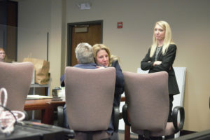 Stephanie "Sam" Westby, center, hugs her attorney Steve Thayer while her other attorney, Jacy Thayer, right, looks on Thursday afternoon, Feb. 9, 2023, in Clark County Superior Court. A judge acquitted her of second-degree murder and first-degree assault charges in the September 2019 fatal shooting of her husband. (Contributed photo by Becca Robbins, courtesy of The Columbian)